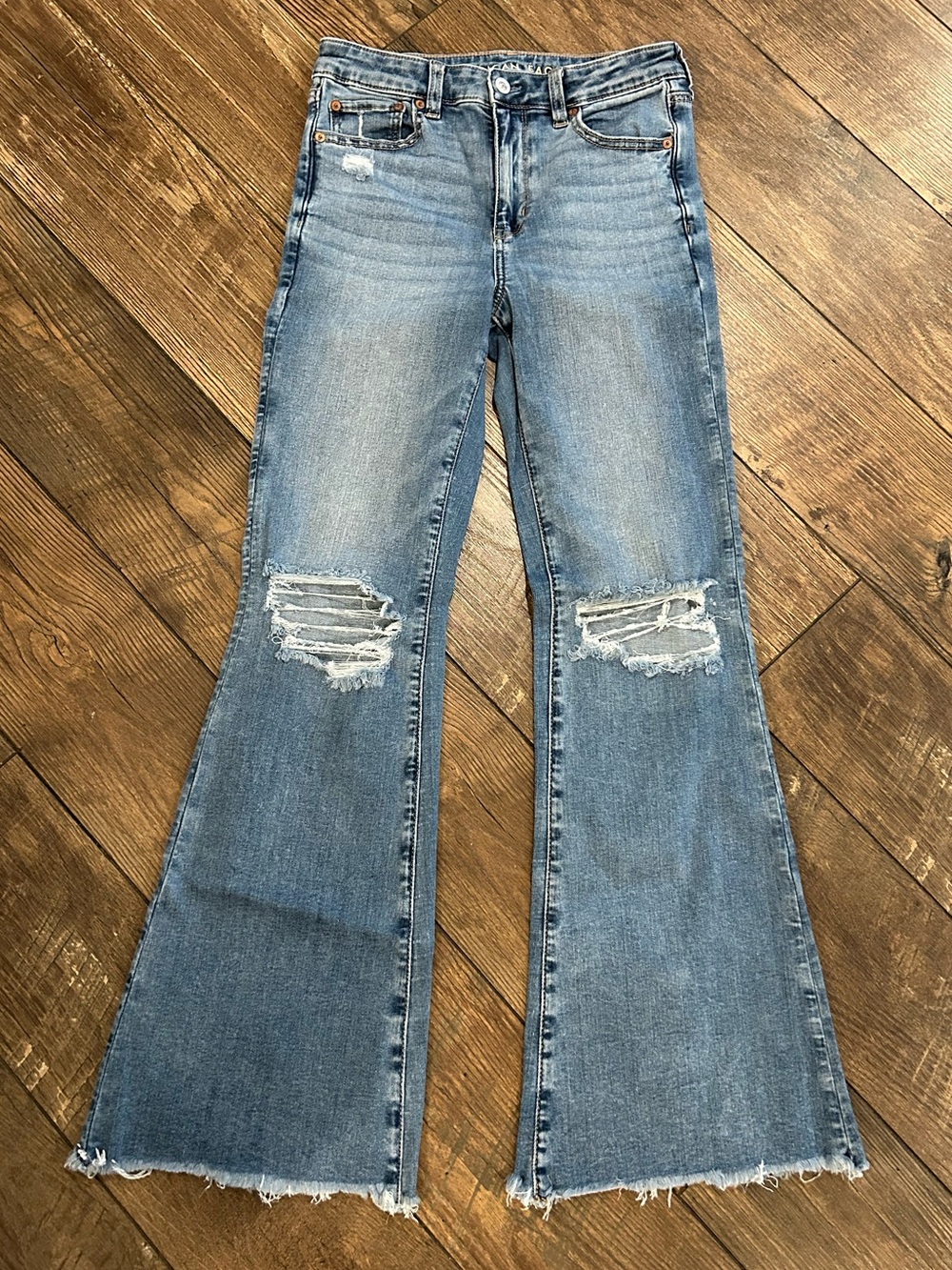 American Eagle Vintage Distressed Flare Jeans Medium Wash Raw Hem